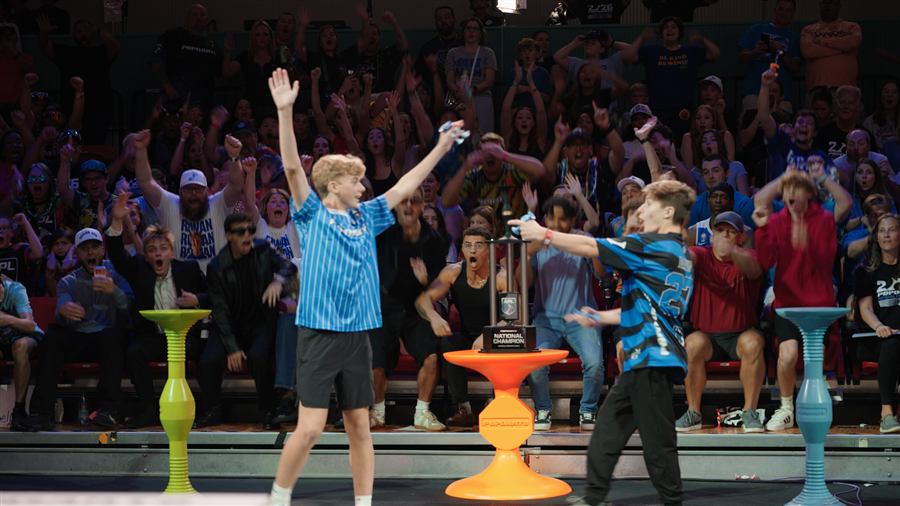 Players celebrating on the court.