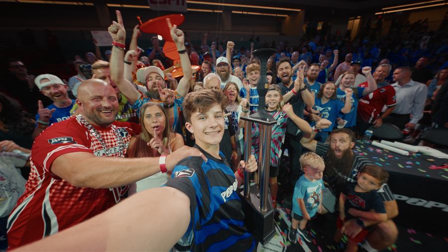 A fan celebrating courtside.
